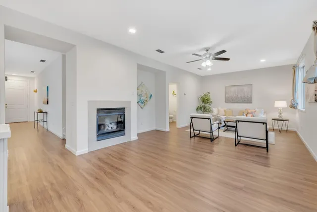 a view of a livingroom with furniture and a fireplace