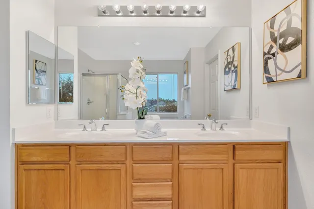 a bathroom with a sink and a mirror