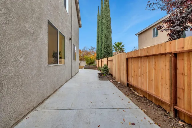 a view of a back yard of the house