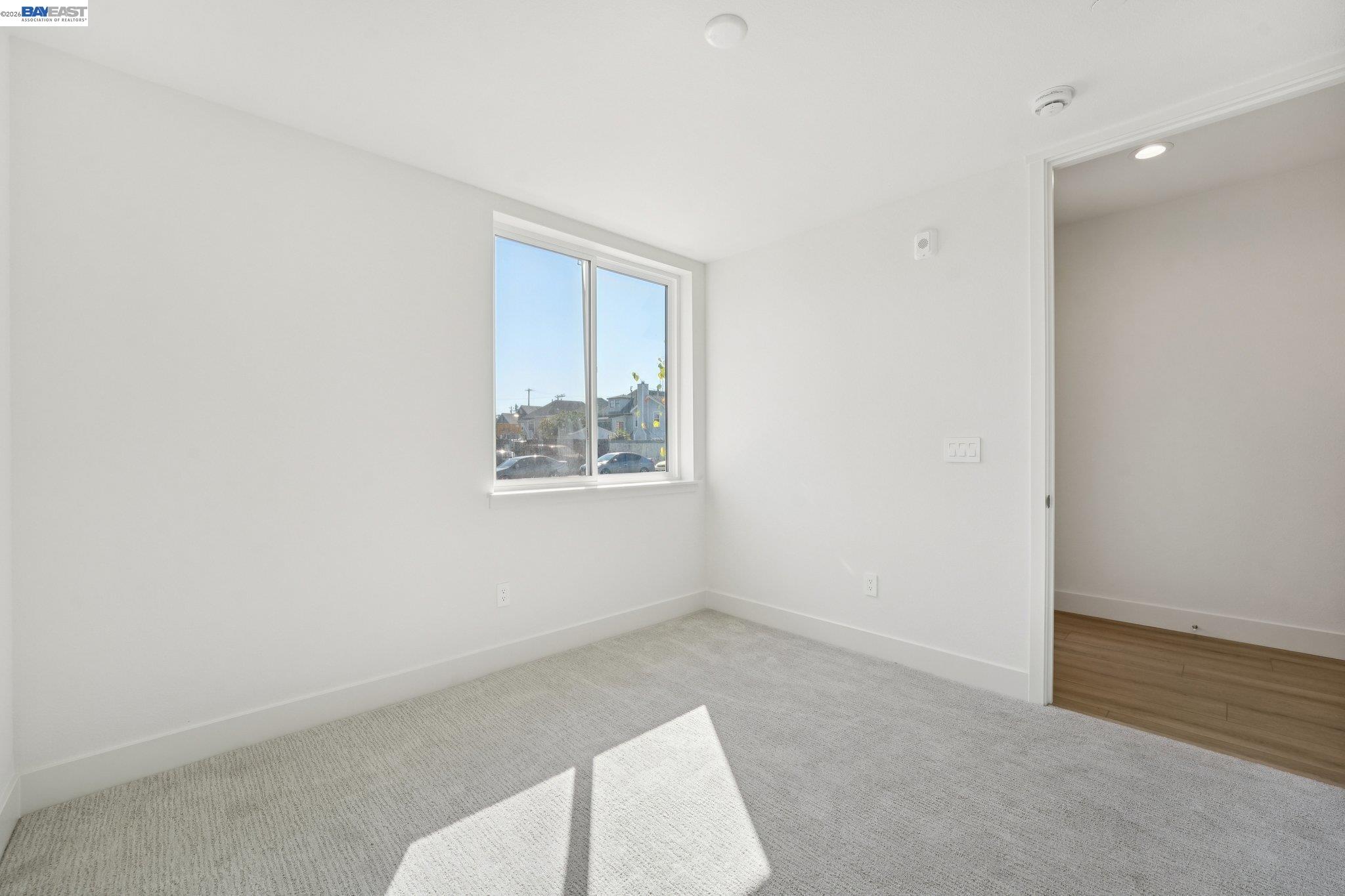 1933 Grand Street Alameda, CA 94501 - Photo 32 of 50 an empty room with windows