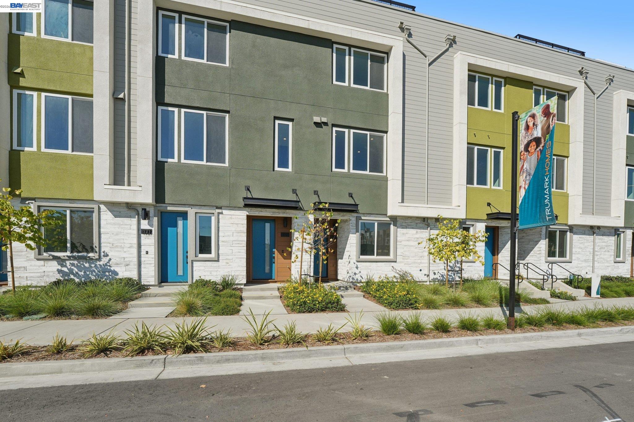1933 Grand Street Alameda, CA 94501 - Photo 5 of 50 a front view of a multi story residential apartment building