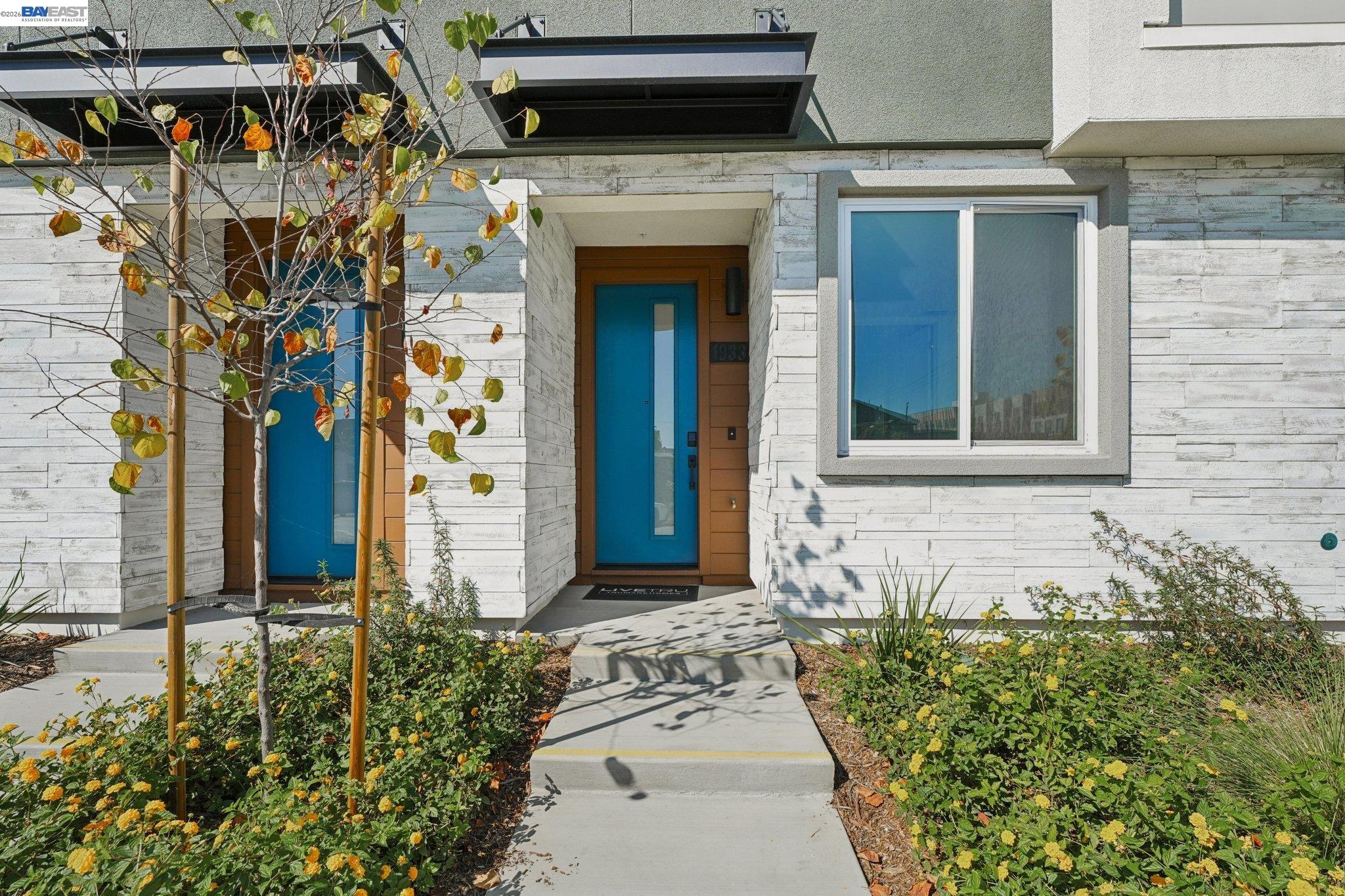 1933 Grand Street Alameda, CA 94501 - Photo 8 of 50 a front view of a house with a yard