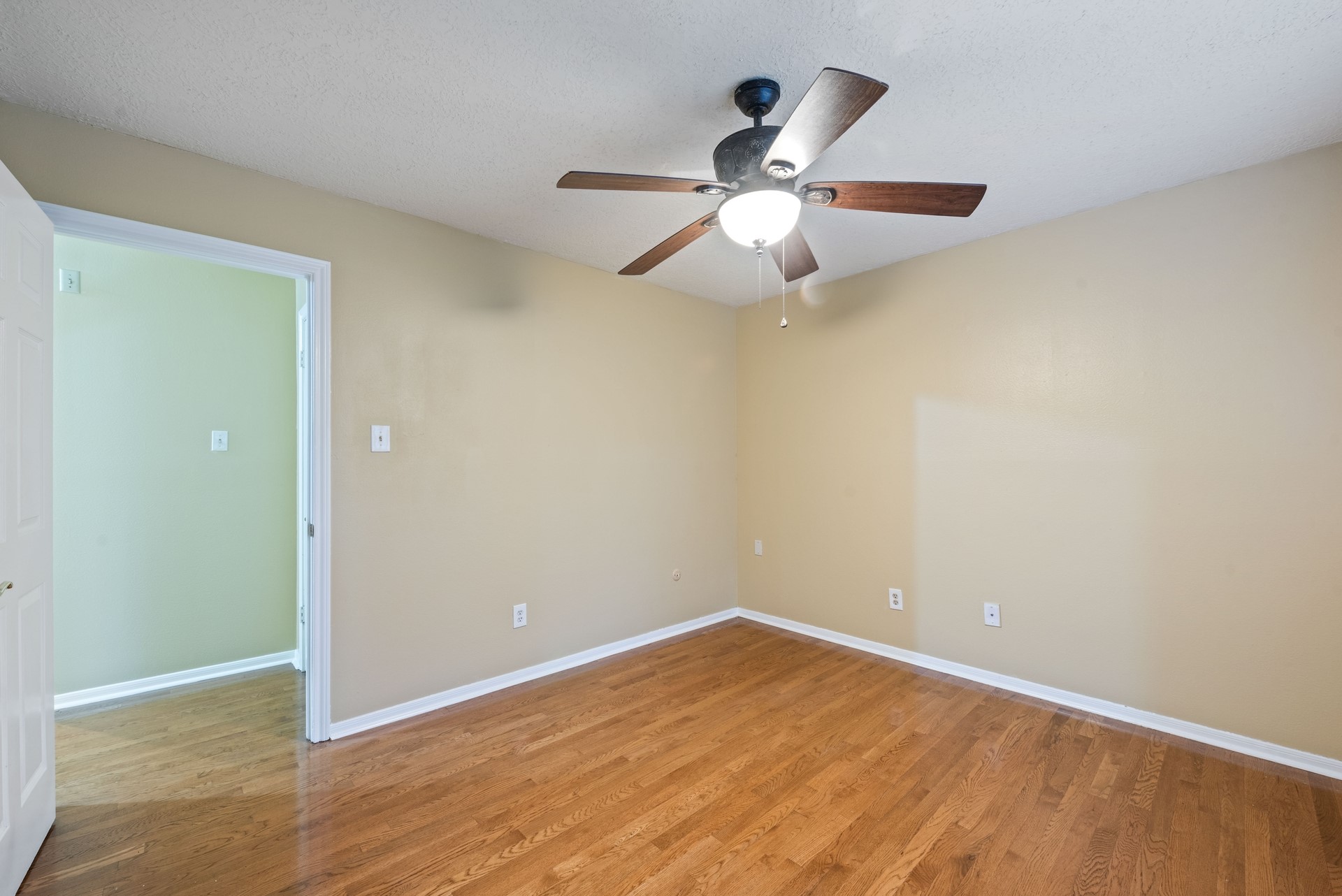9719 Godstone Lane Spring, TX 77379 - Photo 15 of 19 All upstairs bedrooms have wood floors.