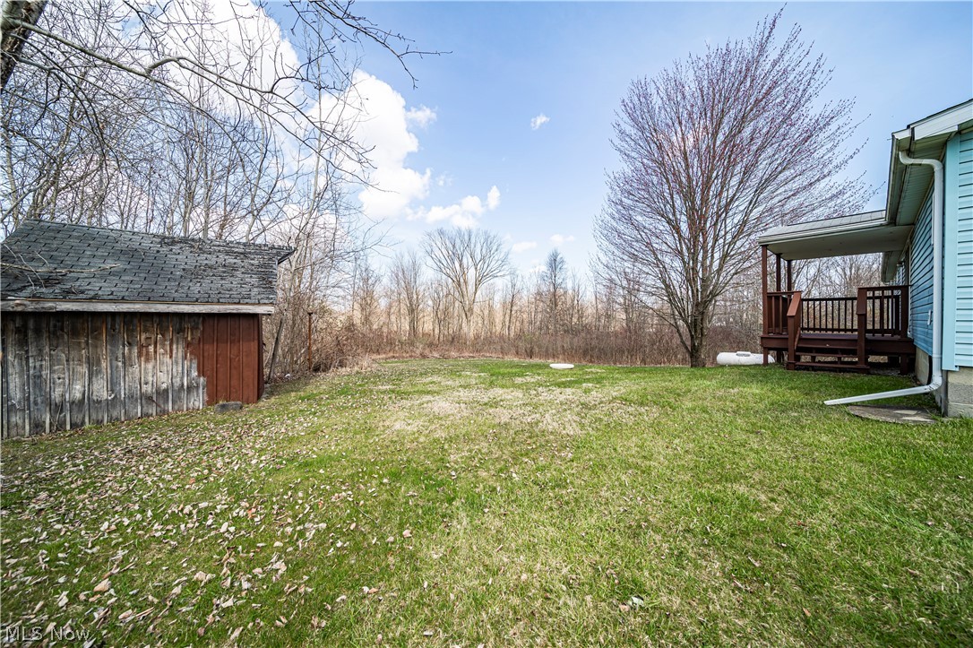3471 Fox Road Kingsville, OH 44048 - Photo 8 of 50 View of yard with a wooden deck