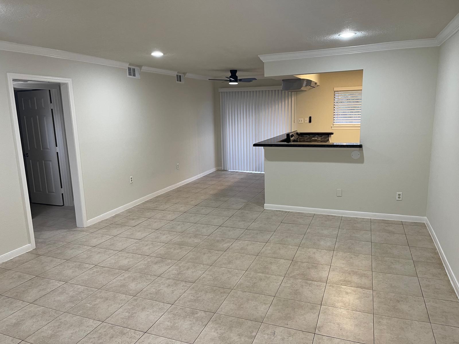 8229 Kingsbrook Road, Unit 228 Houston, TX 77024 - Photo 13 of 17 a view of kitchen with a sink and a refrigerator