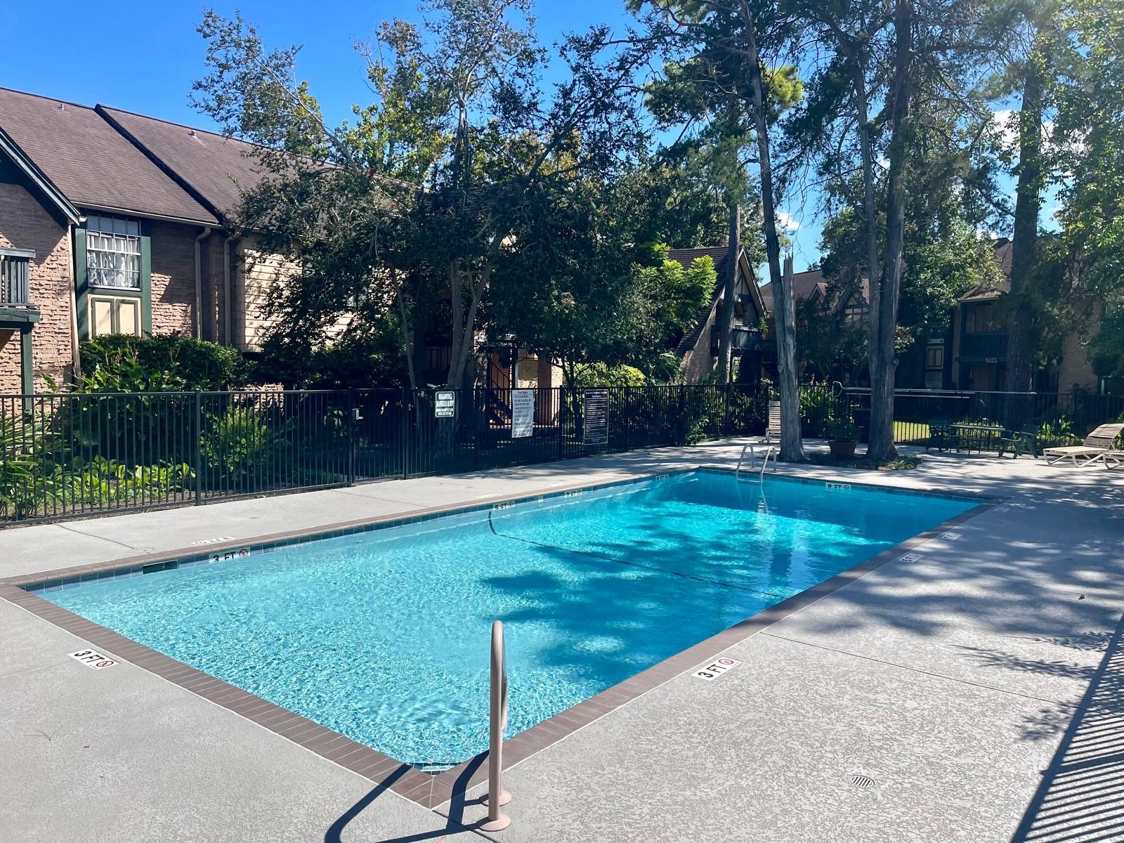 8229 Kingsbrook Road, Unit 228 Houston, TX 77024 - Photo 14 of 17 a view of a yard with plants