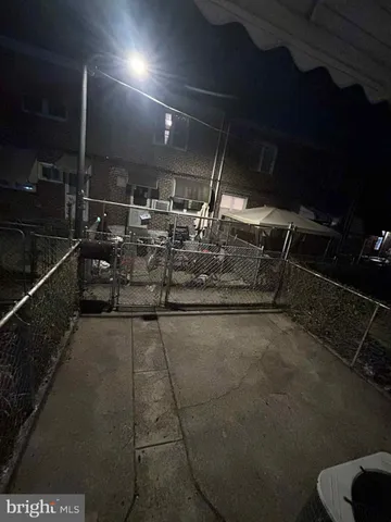 a backyard of a house with seating space