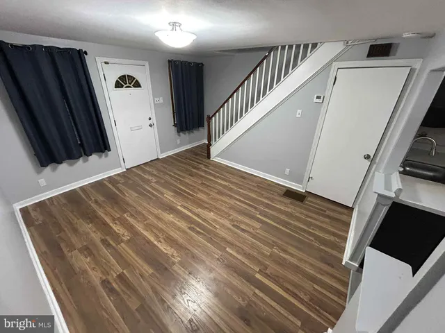 a view of a hallway with staircase