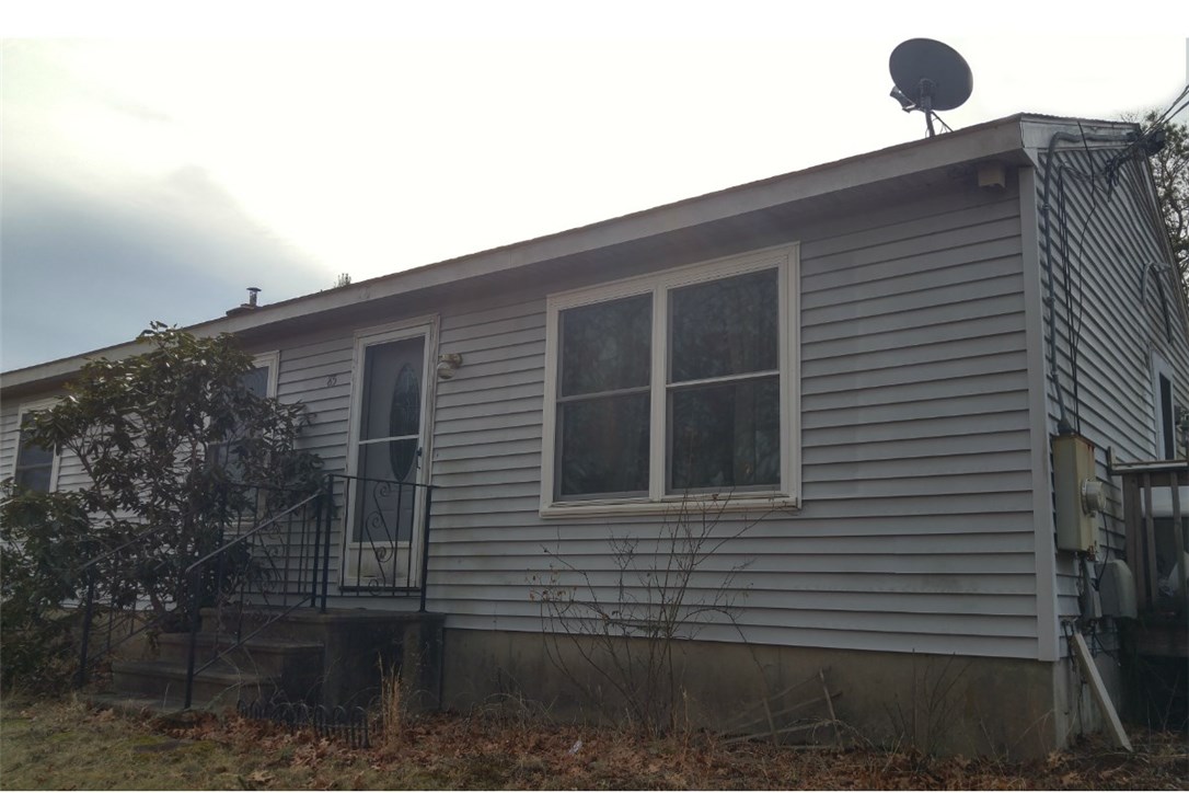 85 Old Shannock Road in Charlestown is a 3 BR, 1,056 sq ft Ranch with 0.91 acres, a storage shed and a two car large garage.