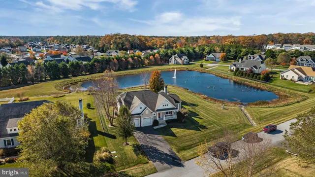 a view of a swimming pool with a lake view