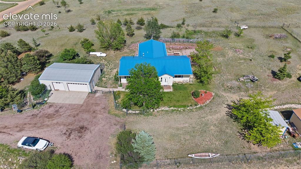 13075 Blaney Road South Peyton, CO 80831 - Photo 38 of 40 Aerial view showing main house and 4 car garage.