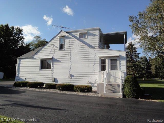 12970 Hannan Road Romulus, MI 48174 - Photo 12 of 12 SIDE.jpg