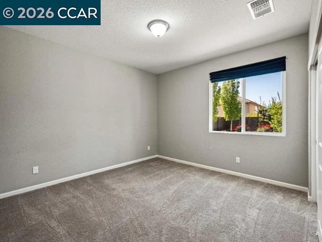 5525 Mossy Stone Way Rancho Cordova, CA 95742 - Photo 11 of 31 an empty room with a window