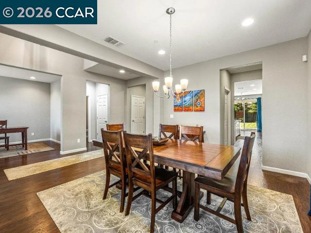 5525 Mossy Stone Way Rancho Cordova, CA 95742 - Photo 2 of 31 a view of a dining room with furniture