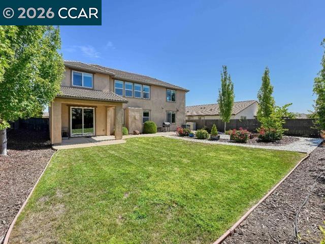 5525 Mossy Stone Way Rancho Cordova, CA 95742 - Photo 21 of 31 a front view of a house with garden
