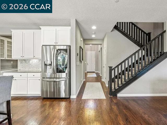 5525 Mossy Stone Way Rancho Cordova, CA 95742 - Photo 5 of 31 a view of kitchen with stainless steel appliances refrigerator microwave and stove
