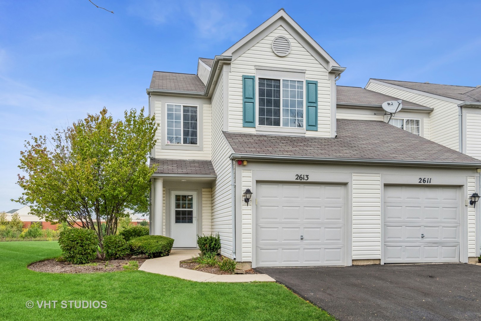 2613 Carrolwood Road Naperville, IL 60540 - Photo 1 of 11 front view of a house with a yard
