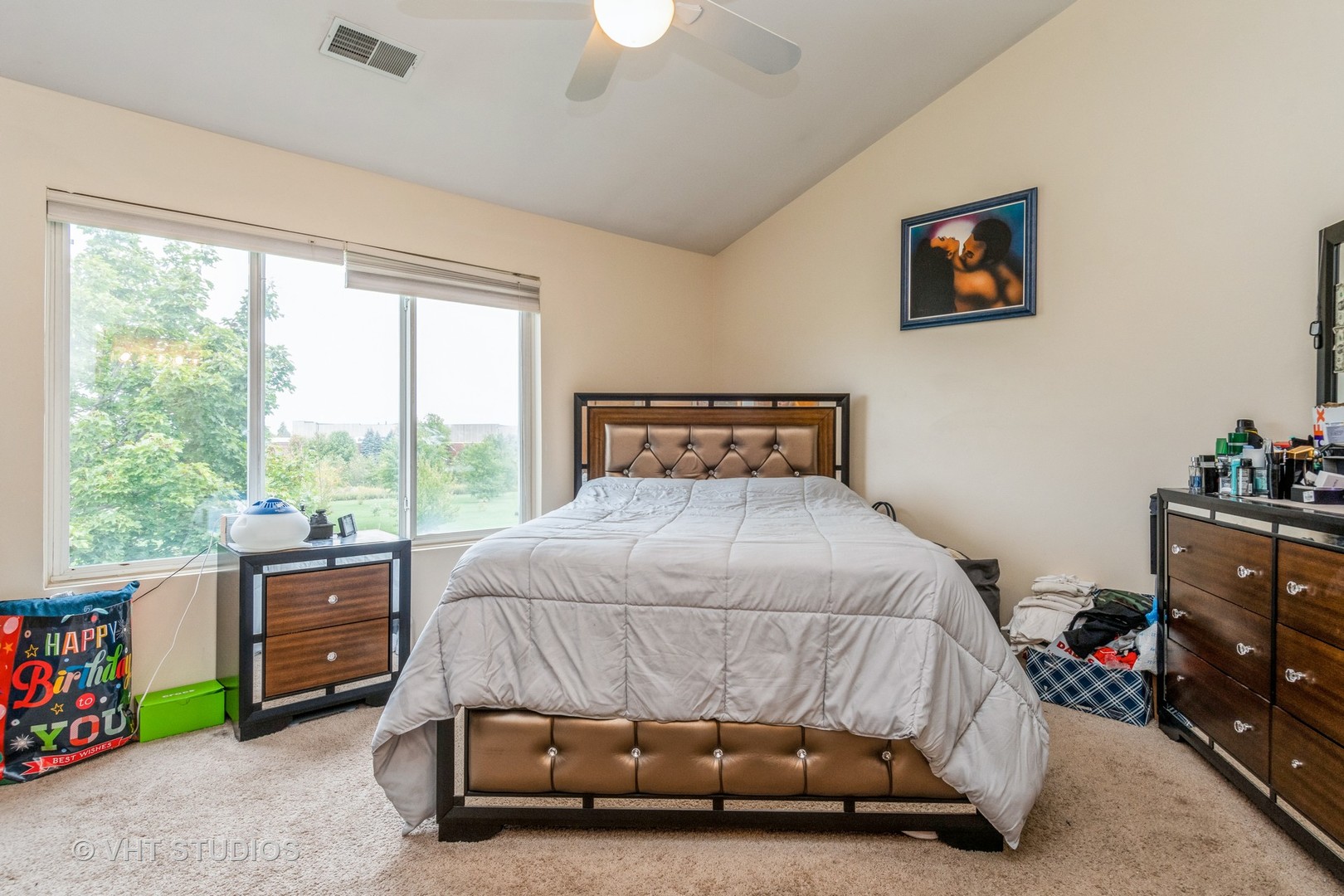 2613 Carrolwood Road Naperville, IL 60540 - Photo 6 of 11 a bedroom with a bed and a window