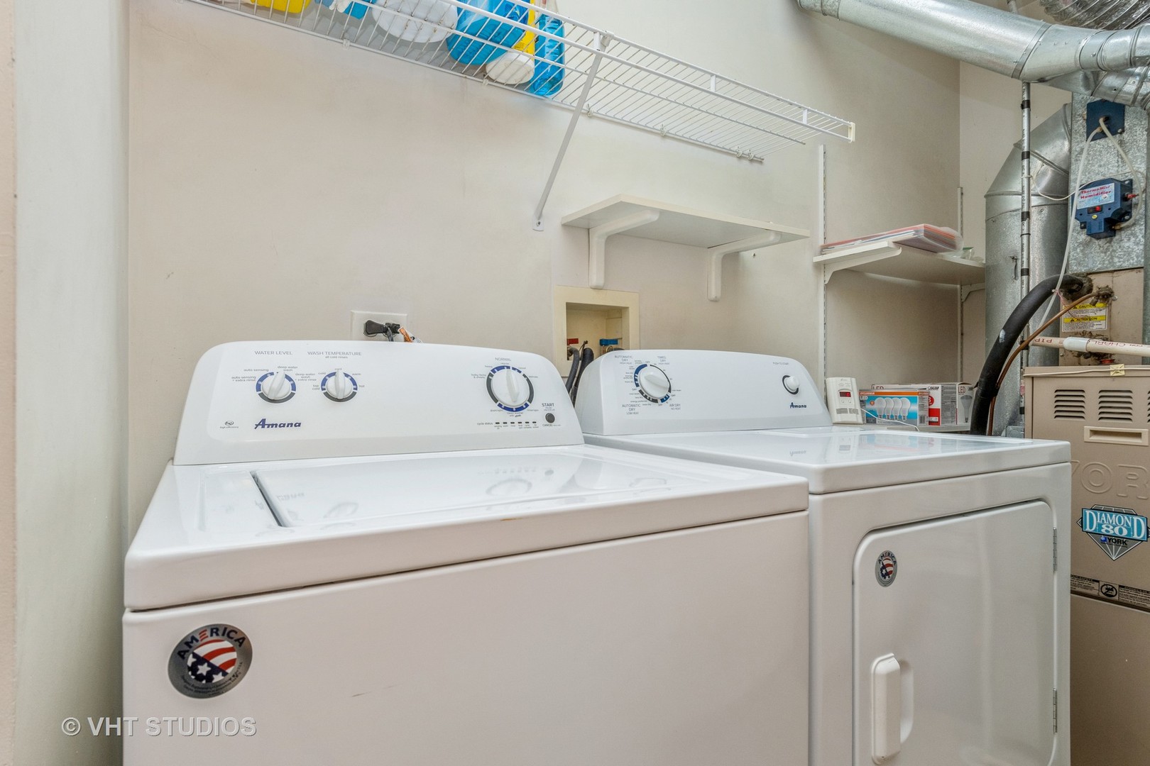 2613 Carrolwood Road Naperville, IL 60540 - Photo 9 of 11 a utility room with dryer and washer