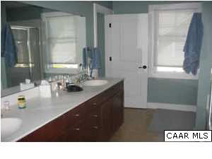827 Village Road Charlottesville, VA 22903 - Photo 7 of 11 Master bedroom bath - double vanities, separate shower