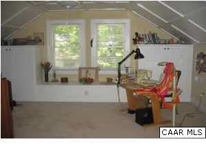 827 Village Road Charlottesville, VA 22903 - Photo 8 of 11 Third floor loft/bonus room. Great light. Note ceilng detail and built ins. Separate zoned heating and air condition on each floor. This floor also has fourth bedroom and full bath.