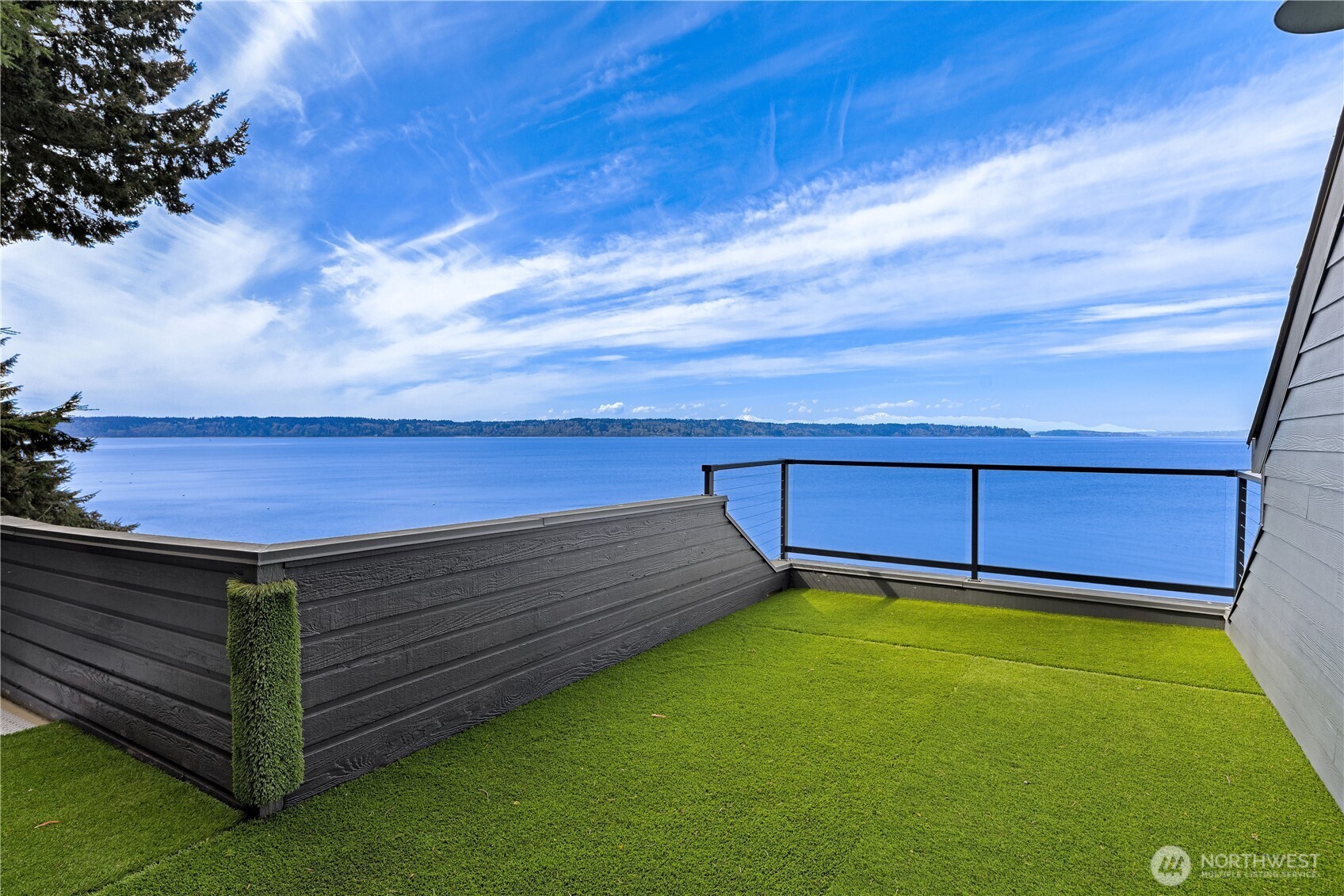 16611 Maplewild Avenue Southwest Burien, WA 98166 - Photo 15 of 40 a view of a backyard with a small cabin