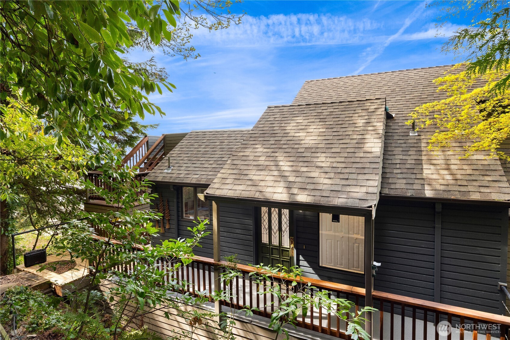 16611 Maplewild Avenue Southwest Burien, WA 98166 - Photo 18 of 40 a front view of a house with a garden