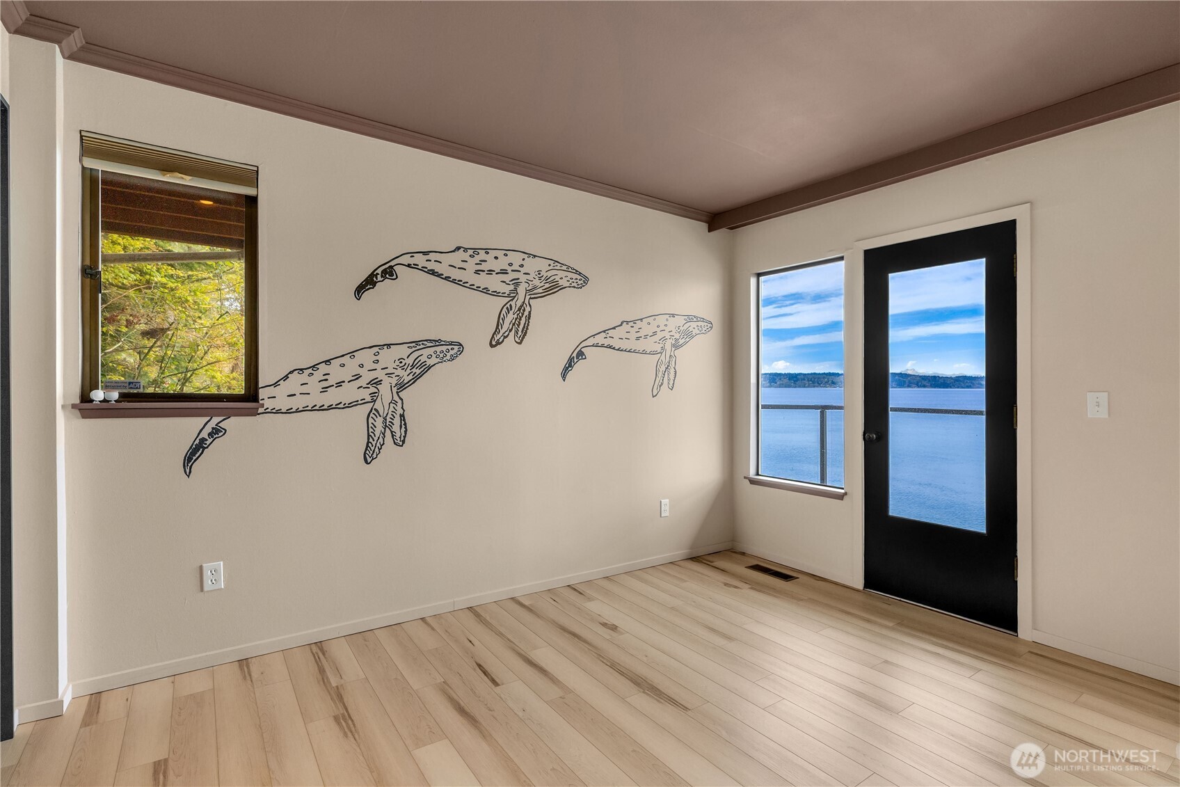 16611 Maplewild Avenue Southwest Burien, WA 98166 - Photo 21 of 40 an empty room with windows