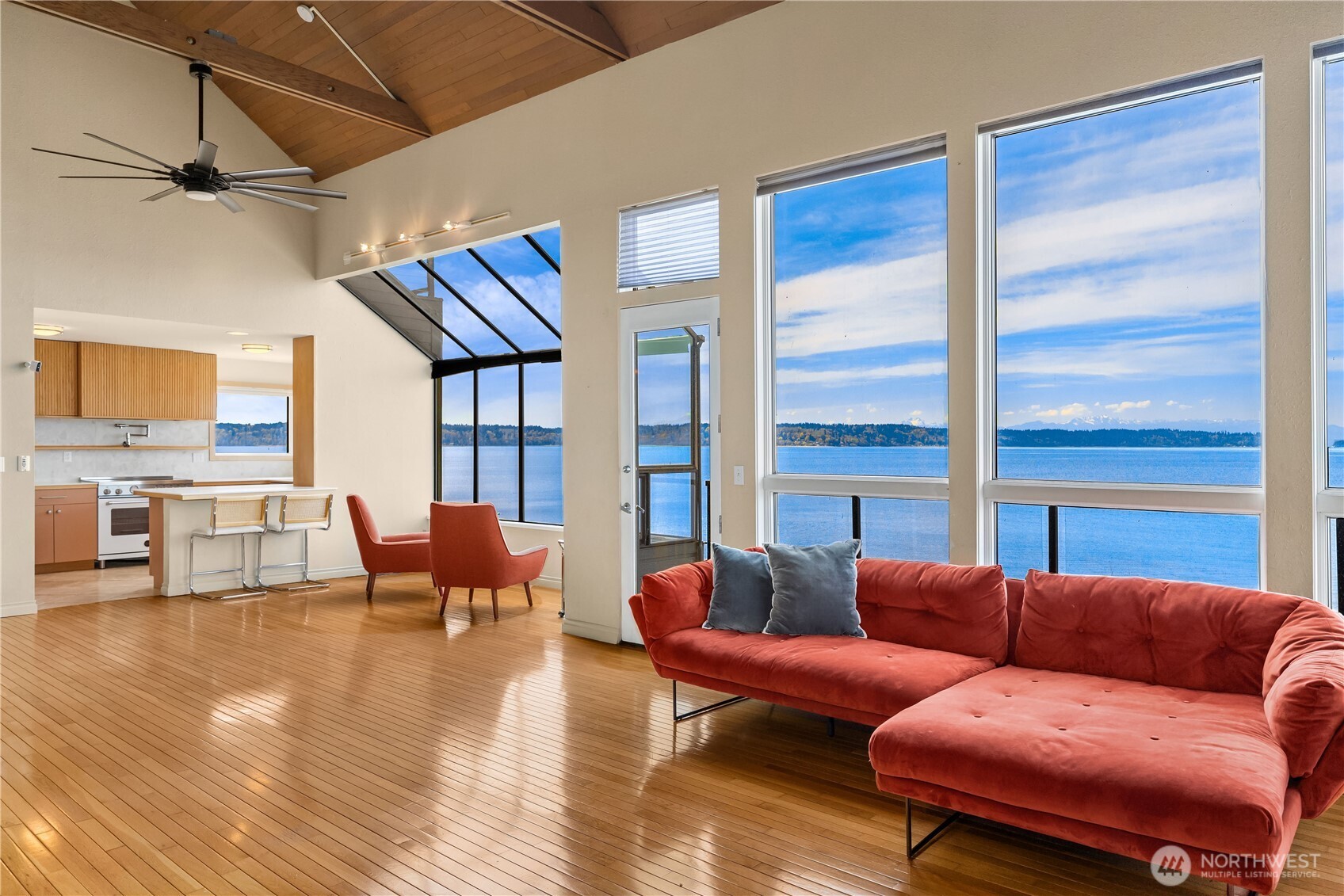 16611 Maplewild Avenue Southwest Burien, WA 98166 - Photo 35 of 40 a living room with furniture a fireplace and a large window