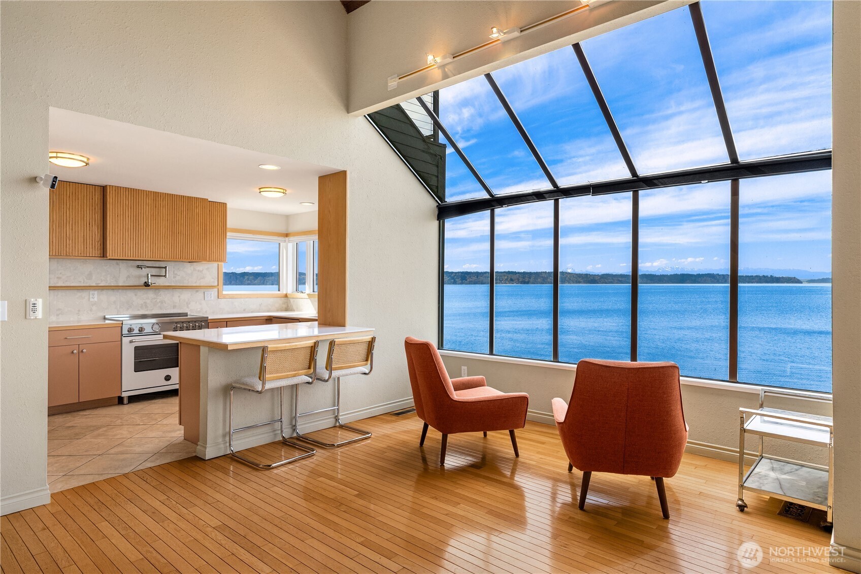 16611 Maplewild Avenue Southwest Burien, WA 98166 - Photo 36 of 40 a view of a kitchen with dining table and chairs