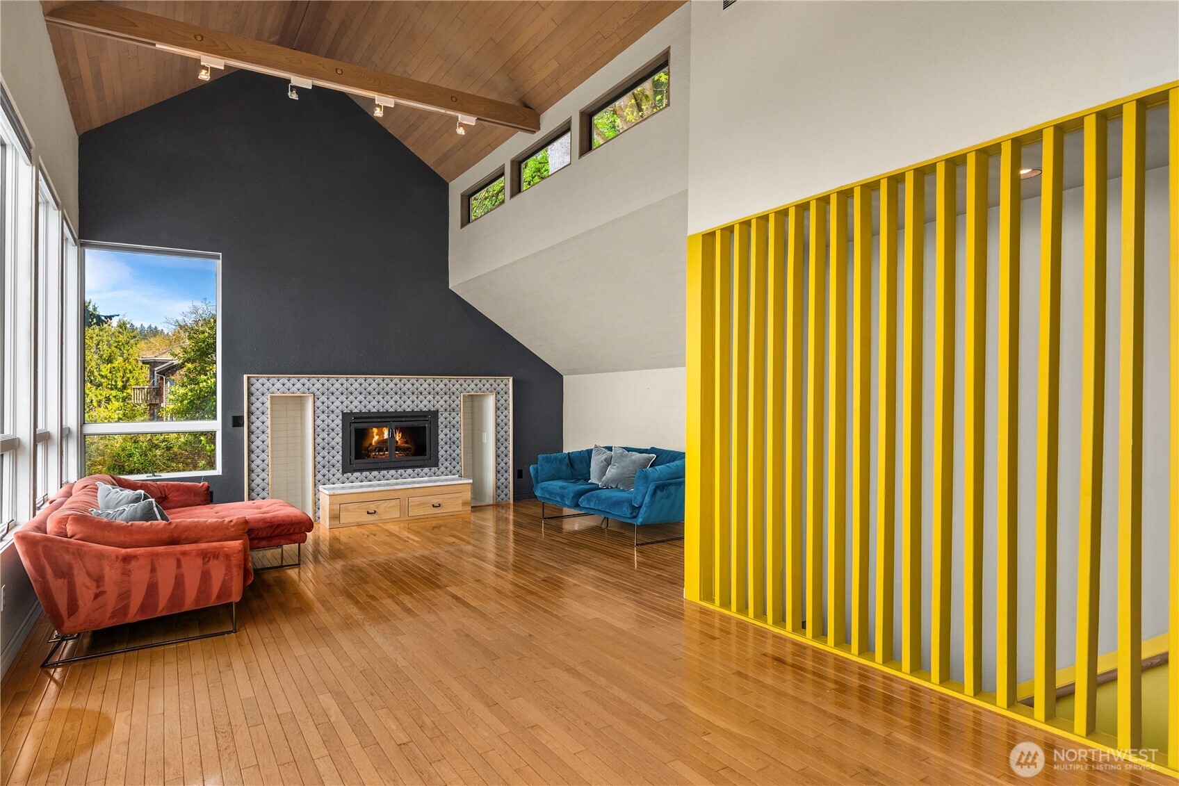 16611 Maplewild Avenue Southwest Burien, WA 98166 - Photo 38 of 40 a living room with furniture and a fireplace