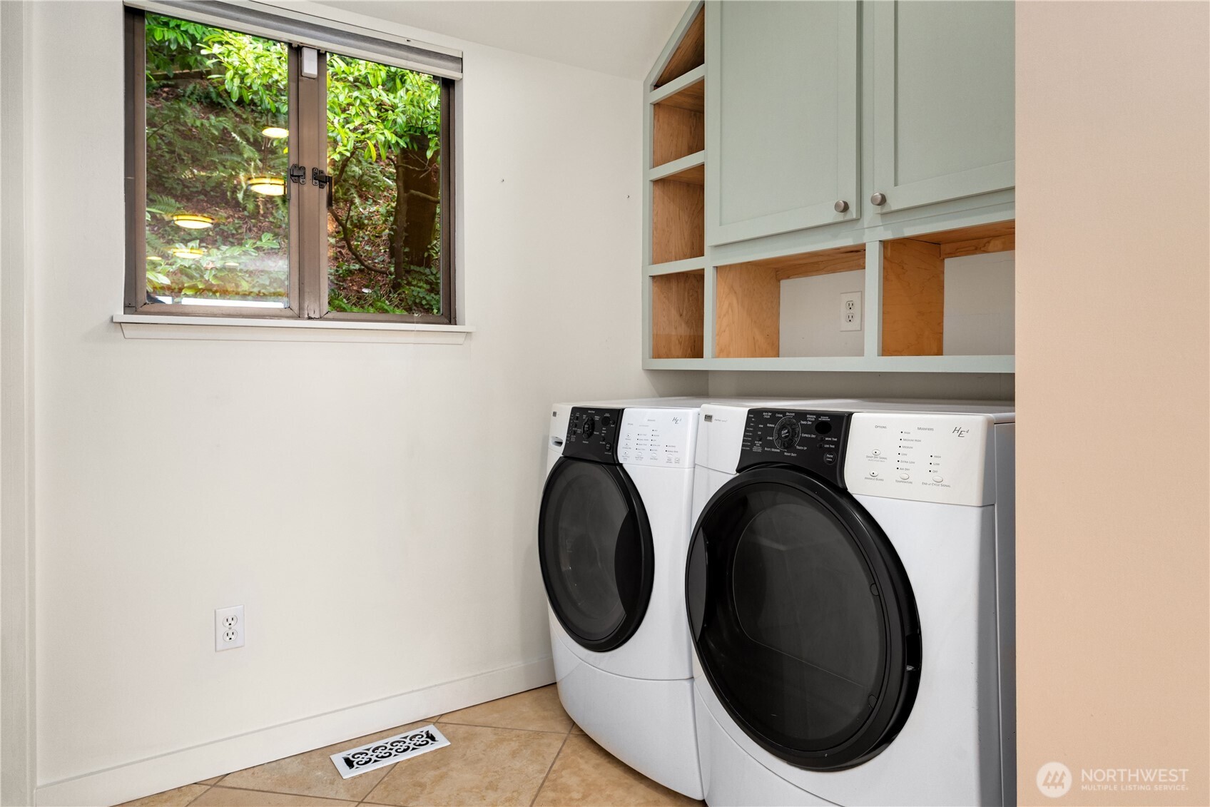 16611 Maplewild Avenue Southwest Burien, WA 98166 - Photo 40 of 40 a utility room with dryer and washer