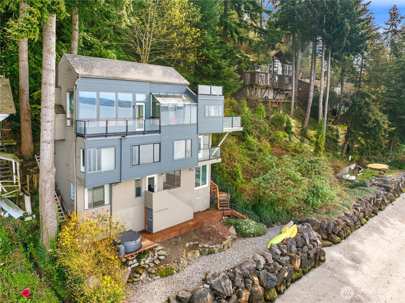 16611 Maplewild Avenue Southwest Burien, WA 98166 - Photo 4 of 40 a front view of a house with a yard