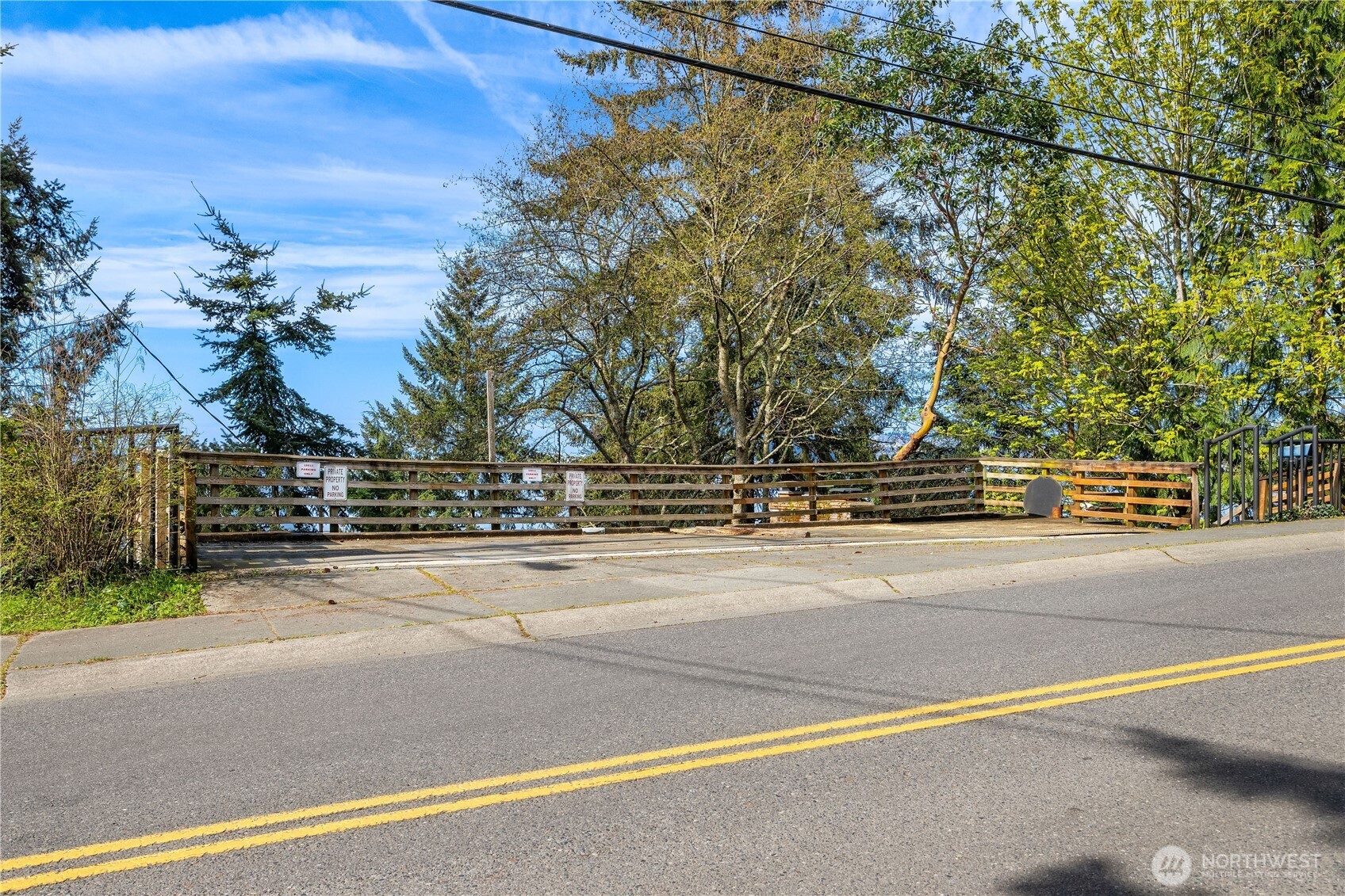 16611 Maplewild Avenue Southwest Burien, WA 98166 - Photo 6 of 40 a view of a city street