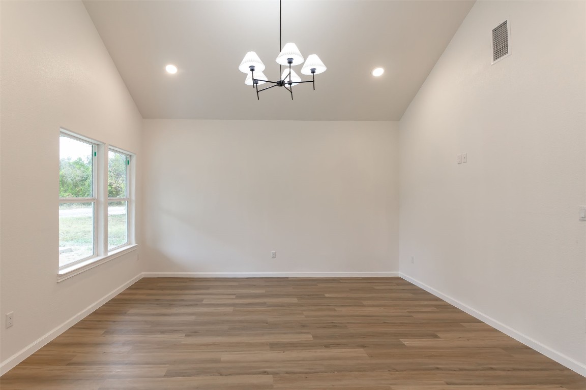 508 Brown Street Lockhart, TX 78644 - Photo 4 of 18 a view of a livingroom with a chandelier