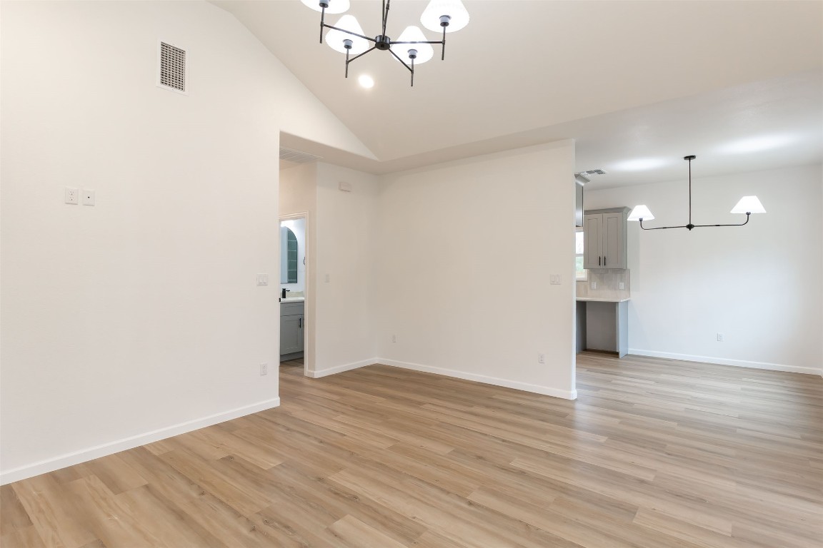 508 Brown Street Lockhart, TX 78644 - Photo 5 of 18 a view of empty room with wooden floor