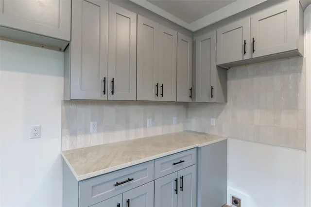 a view of cabinets with wooden cabinets