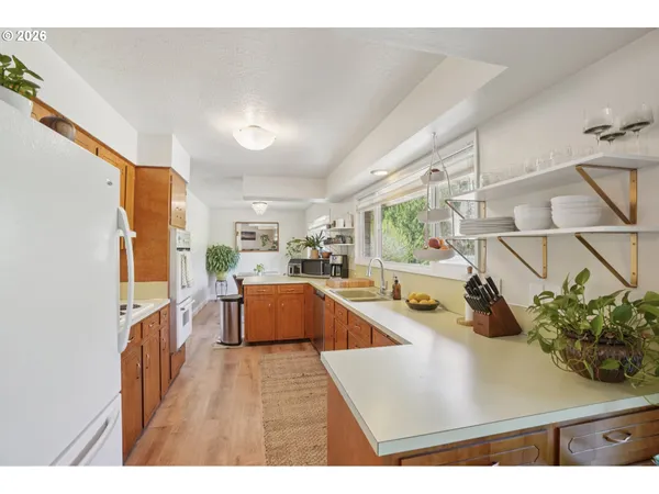 a view of living room and kitchen