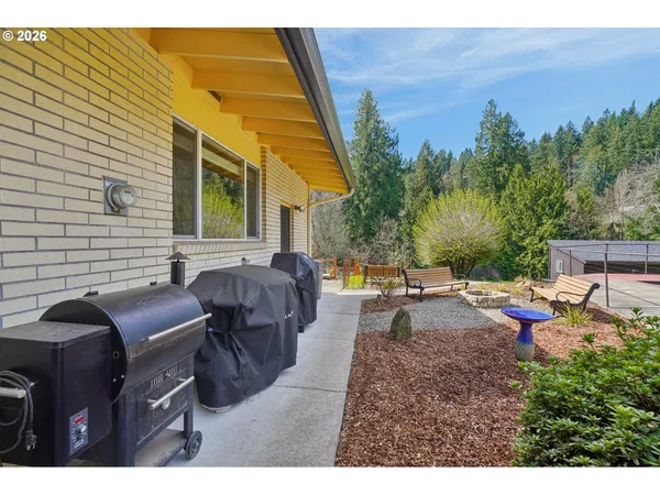 a backyard of a house with seating space