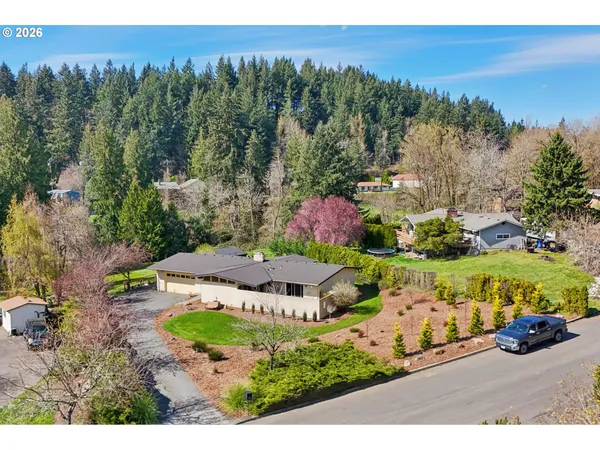 an aerial view of a house with a garden