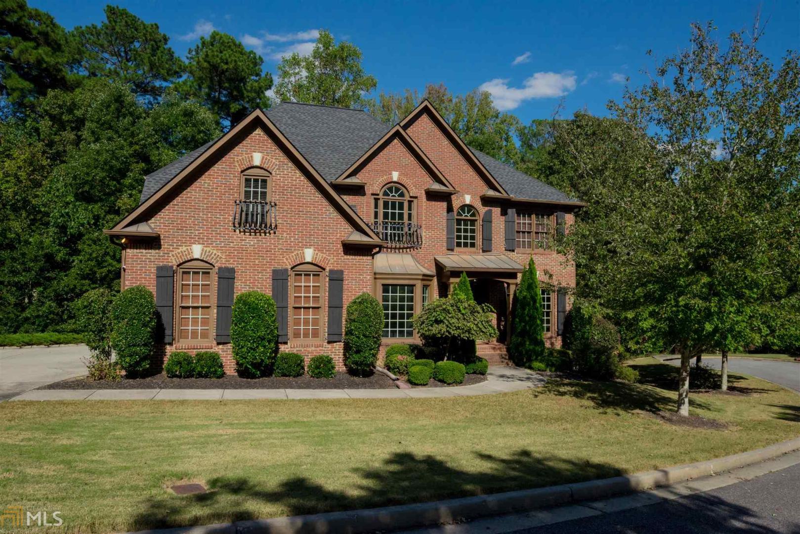 1853 Hamilton Mill Parkway Dacula, GA 30019 - Photo 1 of 1 a front view of a house with garden