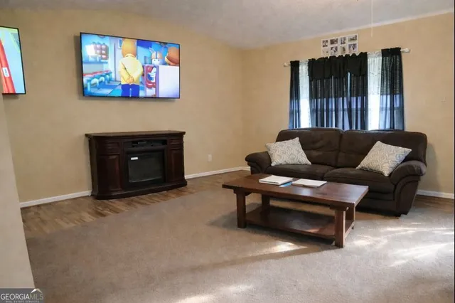 a living room with furniture and a couch