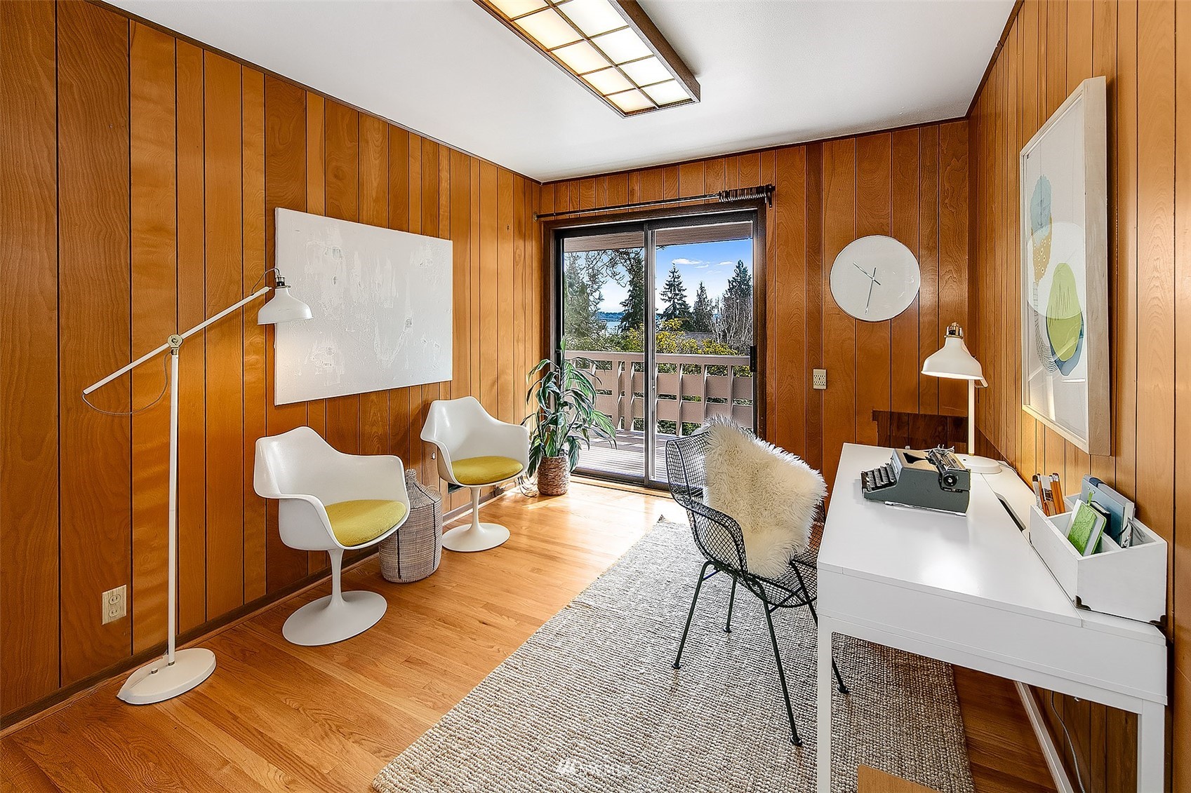5540 Northeast Windermere Road Seattle, WA 98105 - Photo 14 of 40 a living room with furniture and wooden floor