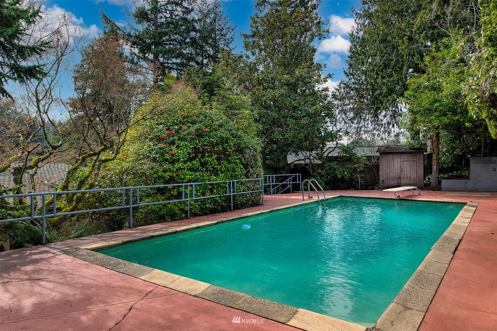 5540 Northeast Windermere Road Seattle, WA 98105 - Photo 29 of 40 a view of a swimming pool with a patio