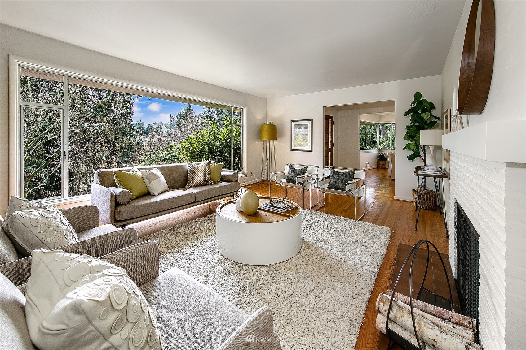 5540 Northeast Windermere Road Seattle, WA 98105 - Photo 6 of 40 a living room with furniture and a large window