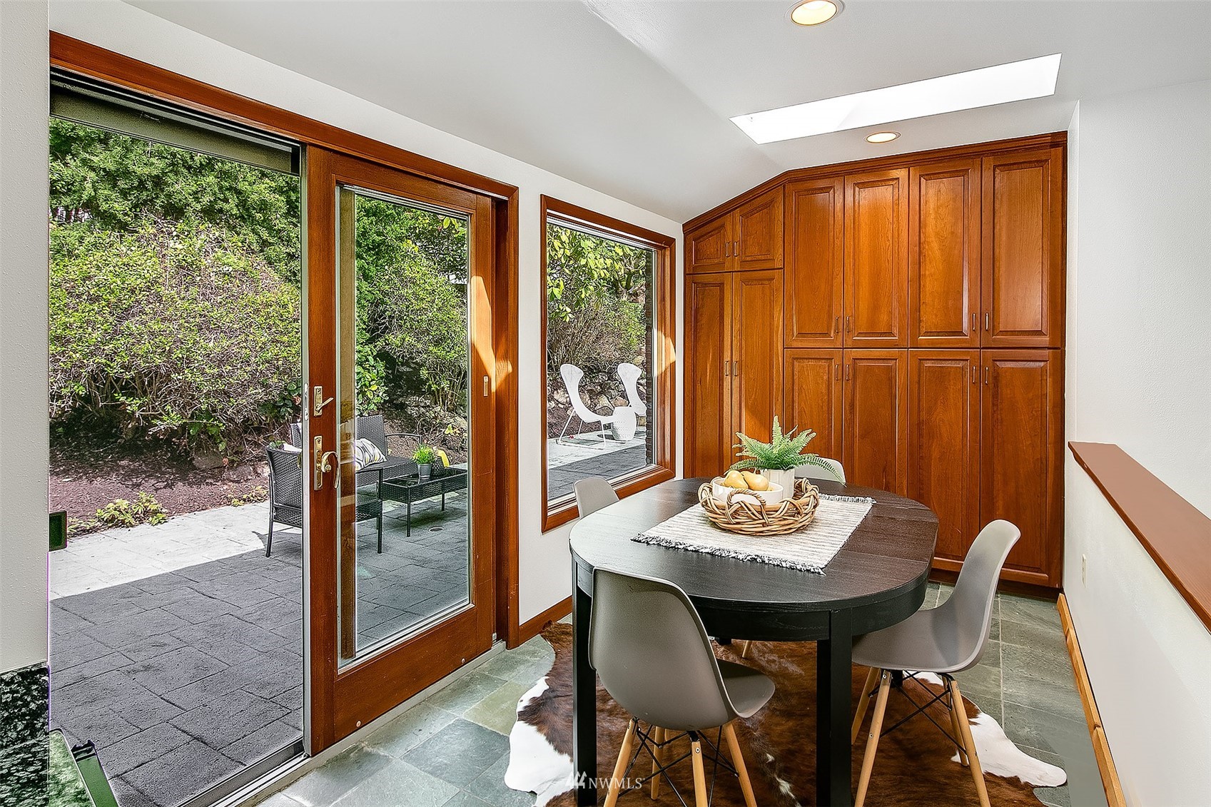 5540 Northeast Windermere Road Seattle, WA 98105 - Photo 10 of 40 a view of a dining room with furniture window and outside view