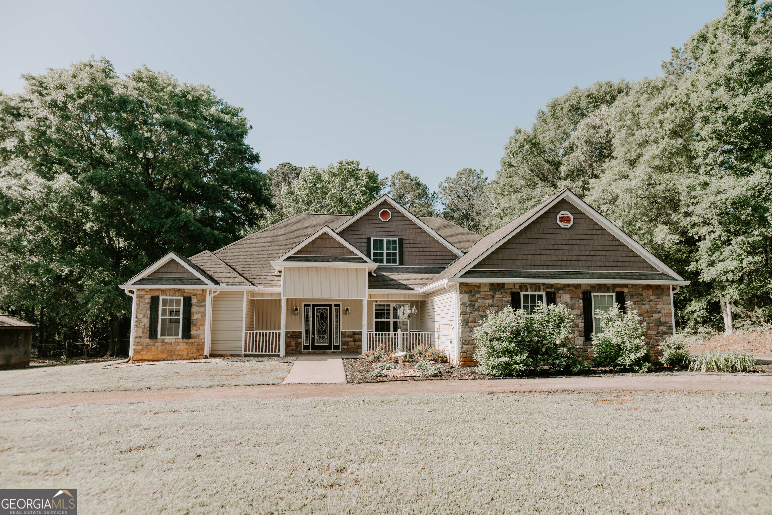 405 Candler Road Williamson, GA 30292 - Photo 1 of 1 front view of a house with a porch