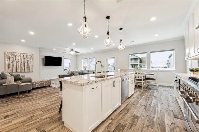 a view of a dining room with furniture and a window