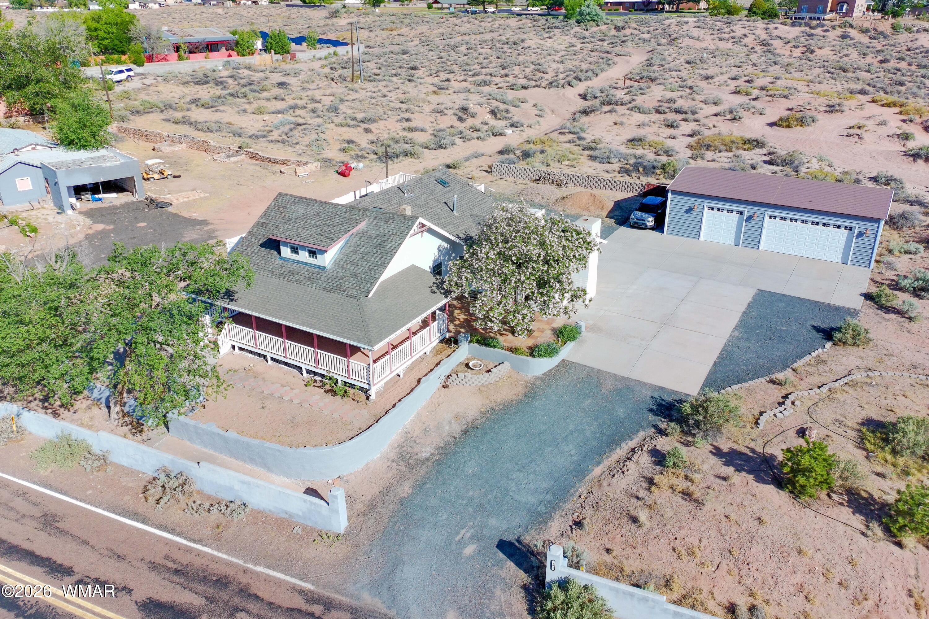 102 Crestview Road Holbrook, AZ 86025 - Photo 51 of 55 an aerial view of a house with a yard