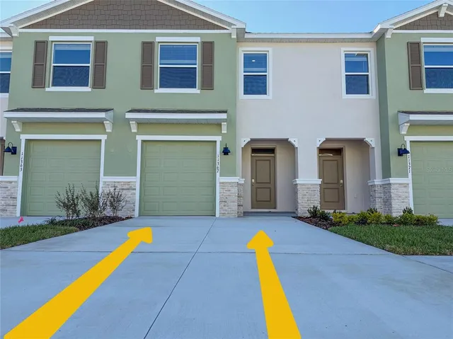 a view of a house with swimming pool